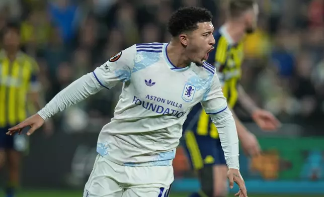 Aston Villa's Jadon Sancho, celebrates scoring the opening goal during a Europa League opening phase soccer match between Fenerbahce and Aston Villa, in Istanbul, Turkey, Thursday, Jan. 22, 2026. (AP Photo/Francisco Seco)