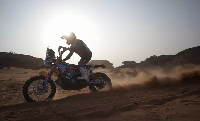 Rider Arnau Lledo competes during the third stage of the Dakar Rally with a start and finish in Alula, Saudi Arabia, Tuesday, Jan. 6, 2026. (AP Photo/Thibault Camus)