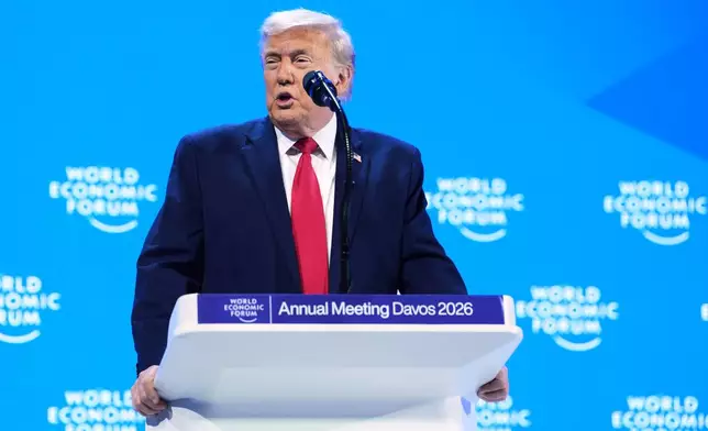 President Donald Trump addresses the audience during the Annual Meeting of the World Economic Forum in Davos, Switzerland, Wednesday, Jan. 21, 2026. (AP Photo/Evan Vucci)