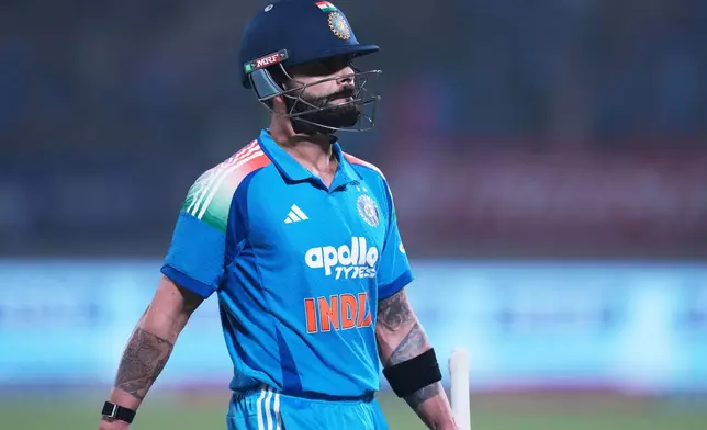 India's Virat Kohli reacts as he leaves the field after losing his wicket during the first One Day International cricket match between India and New Zealand in Vadodara, India, Sunday, Jan. 11, 2026. (AP Photo/Ajit Solanki)