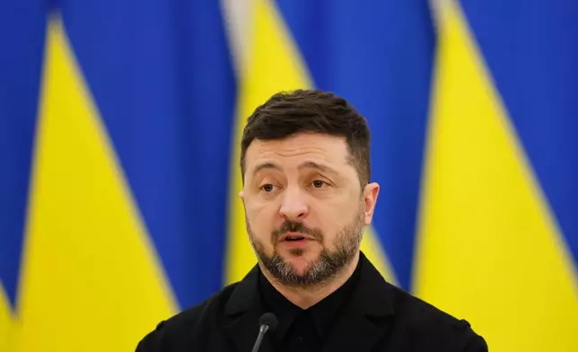 Ukrainian President Volodymyr Zelenskyy speaks during a joint press conference with Lithuania's President Gitanas Nauseda and Polish President Karol Nawrocki, at the Presidential palace in Vilnius, Lithuania, Sunday, Jan. 25, 2026. (AP Photo/Mindaugas Kulbis)
