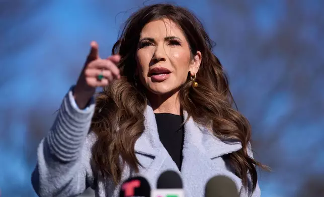 Homeland Security Secretary Kristi Noem speaks with reporters at the White House, Thursday, Jan. 15, 2026, in Washington. (AP Photo/Evan Vucci)