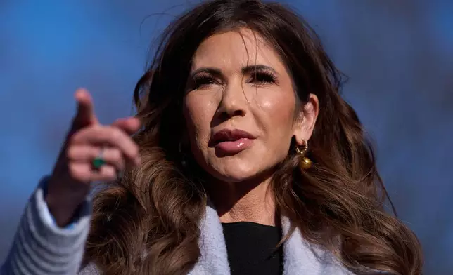 Homeland Security Secretary Kristi Noem speaks with reporters at the White House, Thursday, Jan. 15, 2026, in Washington. (AP Photo/Evan Vucci)