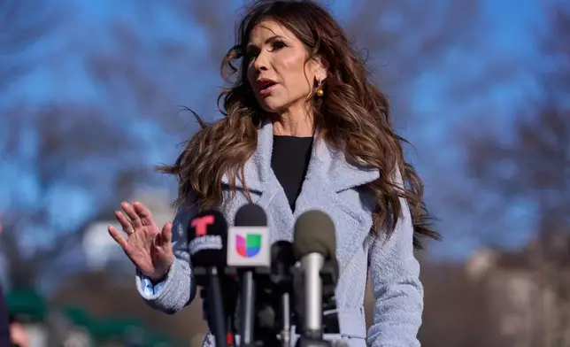 Homeland Security Secretary Kristi Noem speaks with reporters at the White House, Thursday, Jan. 15, 2026, in Washington. (AP Photo/Evan Vucci)