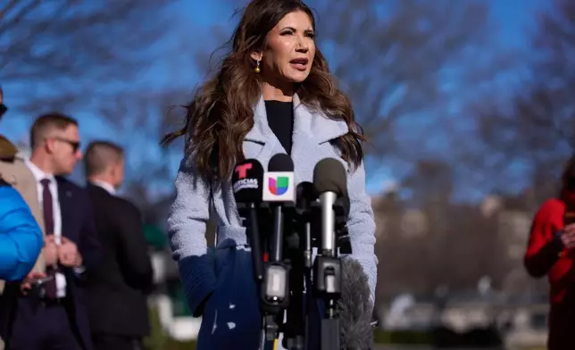 Homeland Security Secretary Kristi Noem speaks with reporters at the White House, Thursday, Jan. 15, 2026, in Washington. (AP Photo/Evan Vucci)