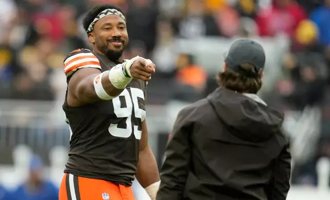 Cleveland Browns defensive end Myles Garrett (95) warms up before an NFL football game against the Pittsburgh Steelers, Sunday, Dec. 28, 2025, in Cleveland. (AP Photo/Sue Ogrocki)