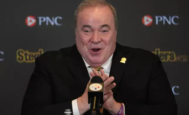 Mike McCarthy meets with reporters after being introduced as the new head coach of the Pittsburgh Steelers in Pittsburgh Tuesday, Jan. 27, 2026. (AP Photo/Gene J. Puskar)