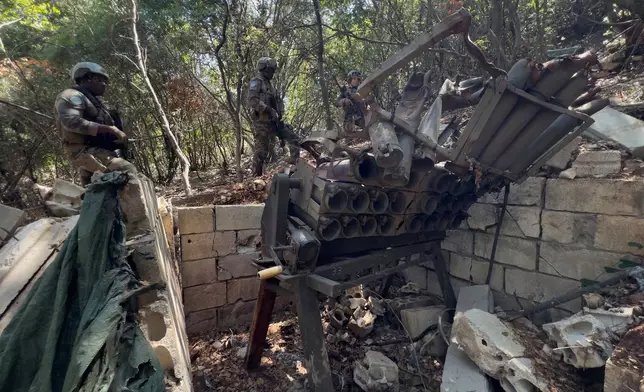 File — French U.N. peacekeepers inspect a destroyed Hezbollah position in the Saluki Valley, southern Lebanon, Wednesday, Aug. 20, 2025. (AP Photo/Hussein Malla, File)