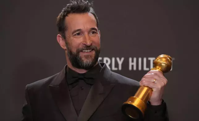 Noah Wyle poses in the press room with the award for best performance by a male actor in a television series – drama for "The Pitt" during the 83rd Golden Globes on Sunday, Jan. 11, 2026, at the Beverly Hilton in Beverly Hills, Calif. (AP Photo/Chris Pizzello)