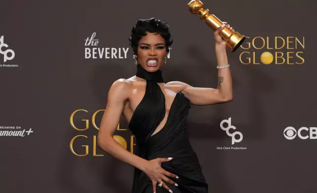 Teyana Taylor poses in the press room with the award for best performance by a female actor in a supporting role in any motion picture for "One Battle After Another" during the 83rd Golden Globes on Sunday, Jan. 11, 2026, at the Beverly Hilton in Beverly Hills, Calif. (AP Photo/Chris Pizzello)