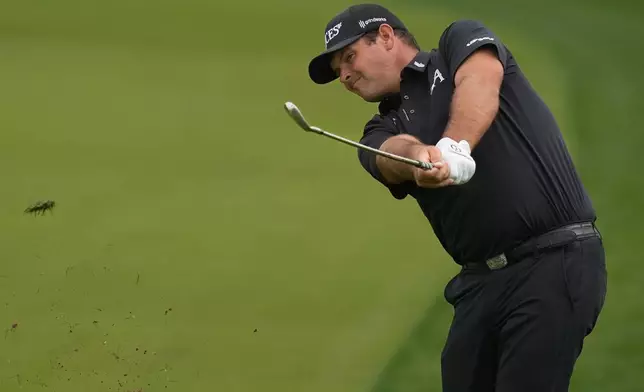 Patrick Reed of the United States plays his second shot on the 8th hole during the final round of the Dubai Desert Classic in United Arab Emirates, Sunday, Jan. 25, 2026. (AP Photo/Altaf Qadri)