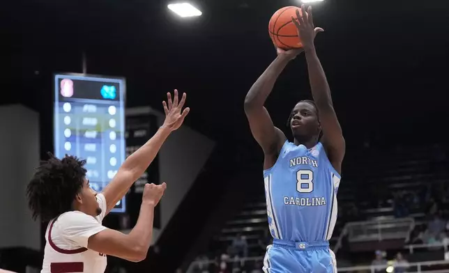 North Carolina forward Caleb Wilson (8) shoots against Stanford during the first half of an NCAA college basketball game in Stanford, Calif., Wednesday, Jan. 14, 2026. (AP Photo/Jeff Chiu)