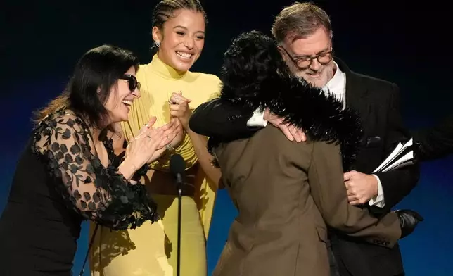 From left, Cassandra Kulukundis, Chase Infiniti, Teyana Taylor, and Paul Thomas Anderson accept the award for best picture for "One Battle After Another" during the 31st Annual Critics Choice Awards on Sunday, Jan. 4, 2026, at The Barker Hanger in Santa Monica, Calif. (AP Photo/Chris Pizzello)