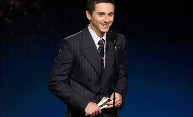 Timothée Chalamet accepts the award for best actor for "Marty Supreme" during the 31st Annual Critics Choice Awards on Sunday, Jan. 4, 2026, at The Barker Hanger in Santa Monica, Calif. (AP Photo/Chris Pizzello)