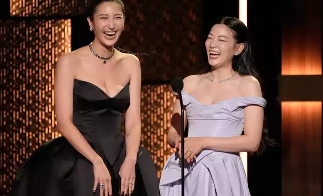 EJAE, left, and Arden Cho present the award for best supporting actress in a drama series during the 31st Annual Critics Choice Awards on Sunday, Jan. 4, 2026, at The Barker Hanger in Santa Monica, Calif. (AP Photo/Chris Pizzello)
