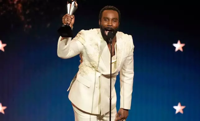 Tramell Tillman accepts the award for best supporting actor in a drama series for "Severance" during the 31st Annual Critics Choice Awards on Sunday, Jan. 4, 2026, at The Barker Hanger in Santa Monica, Calif. (AP Photo/Chris Pizzello)