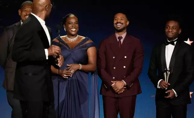 Omar Benson Miller, from left, Delroy Lindo, Wunmi Mosaku, Michael B. Jordan, and Miles Caton accept the award for best casting and ensemble for "Sinners" during the 31st Annual Critics Choice Awards on Sunday, Jan. 4, 2026, at The Barker Hanger in Santa Monica, Calif. (AP Photo/Chris Pizzello)