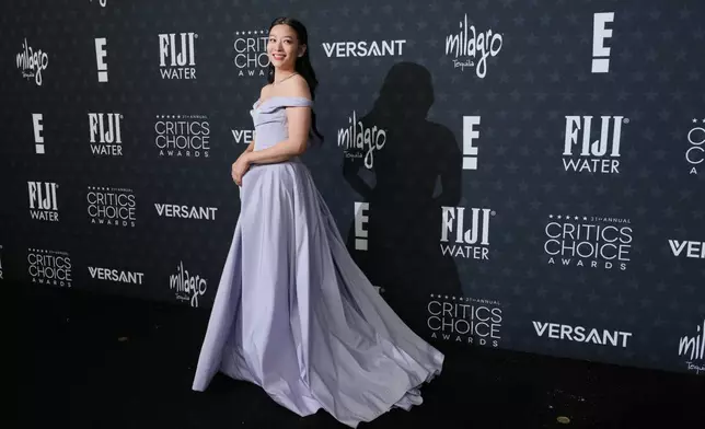 Arden Cho arrives at the 31st Annual Critics Choice Awards on Sunday, Jan. 4, 2026, at The Barker Hanger in Santa Monica, Calif. (Photo by Jordan Strauss/Invision/AP)