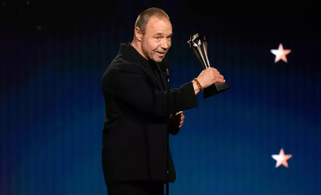 Stephen Graham accepts the award for best actor in a limited series or movie made for television for "Adolescence" during the 31st Annual Critics Choice Awards on Sunday, Jan. 4, 2026, at The Barker Hanger in Santa Monica, Calif. (AP Photo/Chris Pizzello)