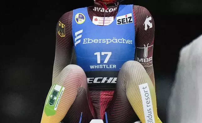 FILE - Julia Taubitz, of Germany, celebrates after winning the women's singles event at the Luge World Championships, in Whistler, B.C., on Friday, Feb. 7, 2025. (Darryl Dyck/The Canadian Press via AP, File)