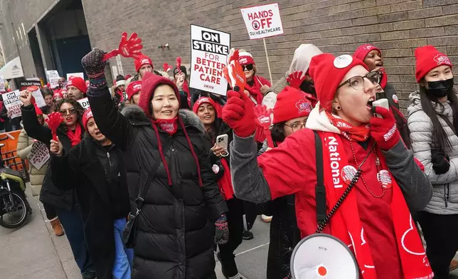 Striking nurses demonstrate outside Mt. Sinai Hospital, in New York, Wednesday, Jan. 14, 2026. (AP Photo/Richard Drew)