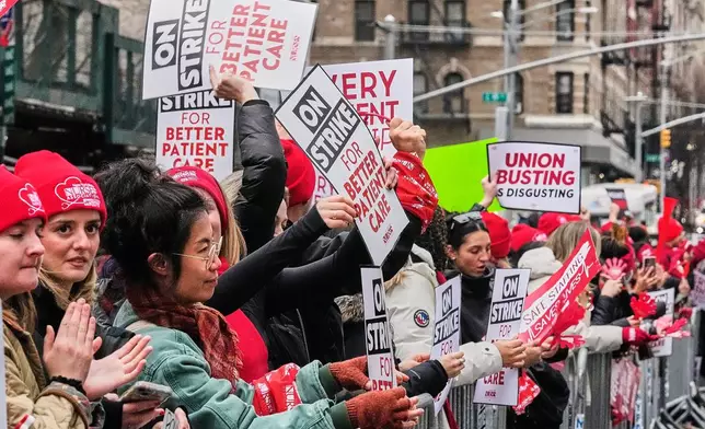 Striking nurses demonstrate outside Mt. Sinai Hospital, in New York, Wednesday, Jan. 14, 2026. (AP Photo/Richard Drew)