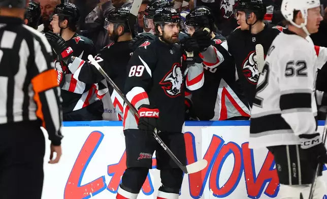 Buffalo Sabres right wing Alex Tuch (89) celebrates after his goal during the second period of an NHL hockey game against the Los Angeles Kings, Thursday, Jan. 29, 2026, in Buffalo, N.Y. (AP Photo/Jeffrey T. Barnes)