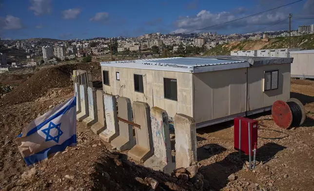 Caravans are placed in a newly-legalized Jewish settlement of Yatziv, adjacent to the Palestinian town of Beit Sahour, in the West Bank, Jan. 19, 2026. (AP Photo/Ohad Zwigenberg)