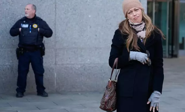 Drew Dixon talks to a fan before entering the courthouse in New York, Monday, Jan. 12, 2026. (AP Photo/Seth Wenig)