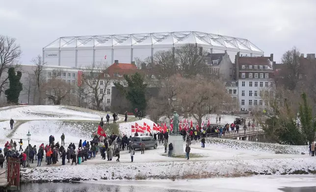 Hundreds of Danish veterans, many of whom fought alongside U.S. troops, stage a silent protest as they march" from Kastellet in Copenhagen to the American embassy in Copenhagen on Saturday, Jan. 31, 2026. (Emil Helms/Ritzau Scanpix via AP)