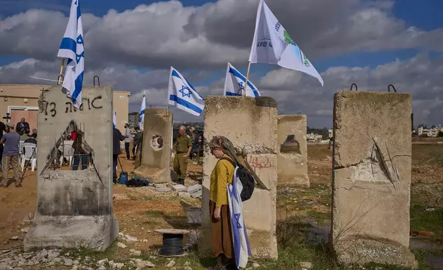 Settlers attend an inauguration ceremony for a newly-legalized Jewish settlement, Yatziv, adjacent to the Palestinian town of Beit Sahour, in the West Bank, Jan. 19, 2026. (AP Photo/Ohad Zwigenberg)