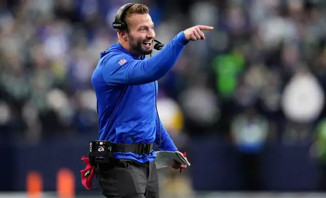 Los Angeles Rams head coach Sean McVay smiles after a touchdown by Kyren Williams during the first half of the NFC Championship NFL football game against the Seattle Seahawks, Sunday, Jan. 25, 2026, in Seattle. (AP Photo/Stephen Brashear)
