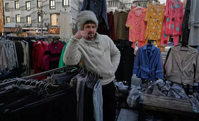 A vendor waits for customers at Tajrish Sq. in Tehran, Iran, Tuesday, Jan. 27, 2026. (AP Photo/Vahid Salemi)