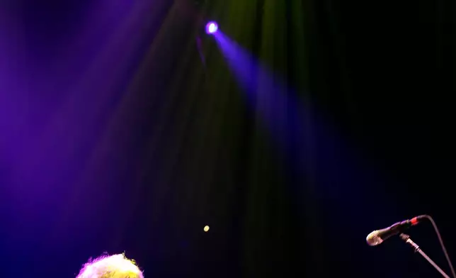 FILE - Bob Weir plays guitar with his band The Dead, formerly the Grateful Dead, at the Forum in the Inglewood section of Los Angeles, Calif. on Saturday May 9, 2009. (AP Photo/Richard Vogel,File)