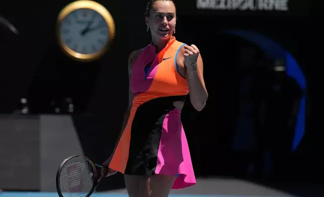 Aryna Sabalenka of Belarus celebrates after defeating Iva Jovic of the U.S. in their quarterfinal match at the Australian Open tennis championship in Melbourne, Australia, Tuesday, Jan. 27, 2026. (AP Photo/Dar Yasin)