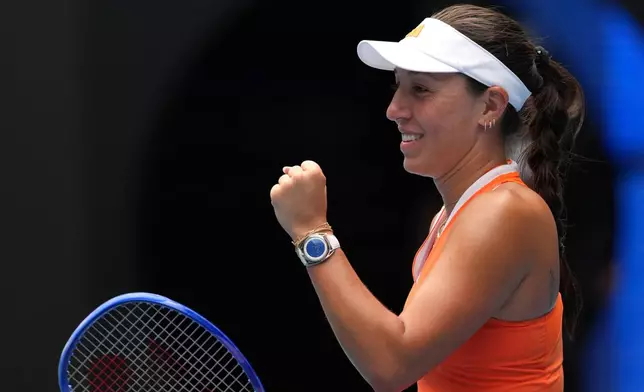 Jessica Pegula of the U.S. celebrates after defeating compatriot Amanda Anisimova during their quarterfinal match at the Australian Open tennis championship in Melbourne, Australia, Wednesday, Jan. 28, 2026. (AP Photo/Asanka Brendon Ratnayake)