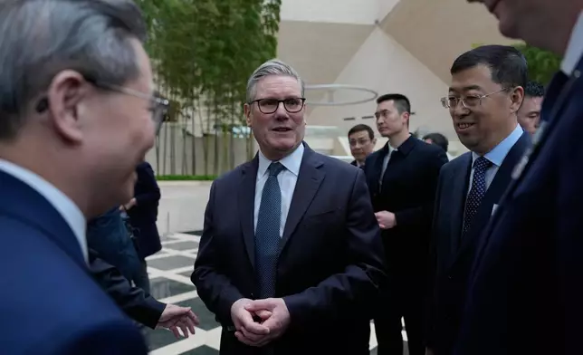 Britain's Prime Minister Keir Starmer attends the UK-China Business Forum held at the headquarters of the Bank of China (BOC) in Beijing, China, Friday, Jan. 30, 2026. (AP Photo/Kin Cheung, Pool)