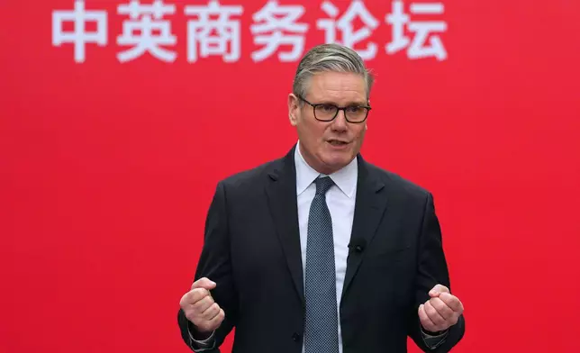 British Prime Minister Keir Starmer delivers remarks at a UK-China Business Forum at the Bank of China in Beijing Friday, Jan. 30, 2026. (Carl Court/Pool Photo via AP)