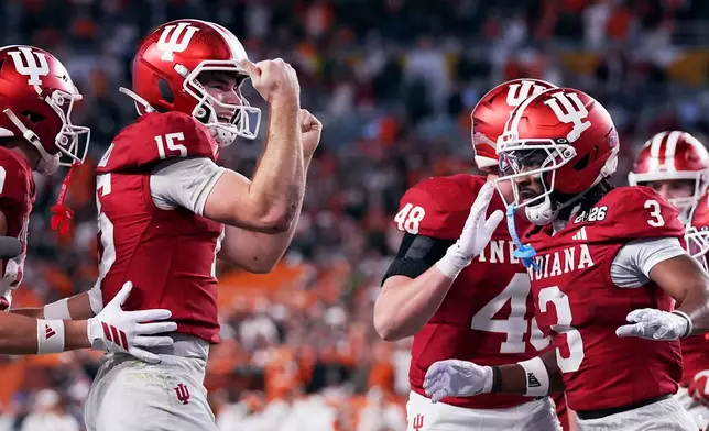 Indiana quarterback Fernando Mendoza celebrates after scoring against Miami during the second half of the College Football Playoff national championship game, Monday, Jan. 19, 2026, in Miami Gardens, Fla. (AP Photo/Marta Lavandier)