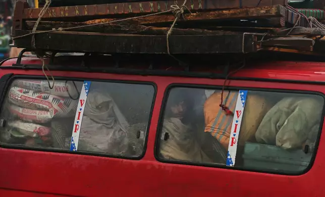 People who fled from Tirah, a town in the Khyber Pakhtunkhwa province, amid uncertainty over a military operation against the Pakistani Taliban, travel towards a registration center in Bara, a town of Pakistan's northwestern Khyber district, Tuesday, Jan. 27, 2026. (AP Photo/Muhammad Sajjad)