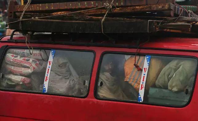 People who fled from Tirah, a town in the Khyber Pakhtunkhwa province, amid uncertainty over a military operation against the Pakistani Taliban, travel towards a registration center in Bara, a town of Pakistan's northwestern Khyber district, Tuesday, Jan. 27, 2026. (AP Photo/Muhammad Sajjad)