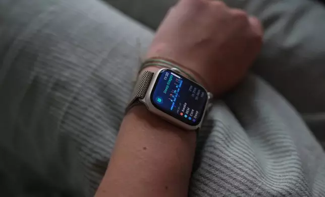 Wearable devices, including Apple Watches, can be used to track sleep, Wednesday, Jan. 21, 2026, in Atlanta, Ga. (AP Photo/Emilie Megnien)