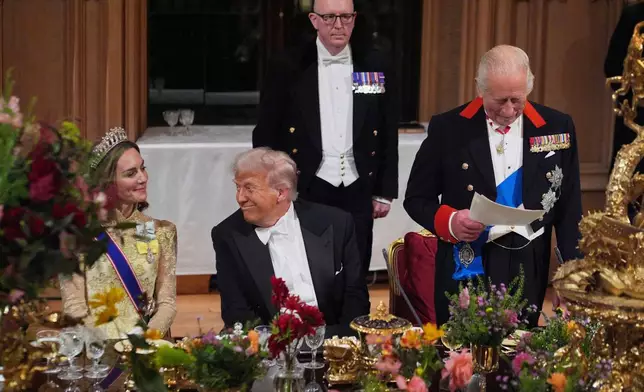 FILE - U.S. President Donald Trump, center, and Kate, Princess of Wales, listen to Britain's King Charles during the State Banquet in Windsor Castle, England, on day one of U.S. President Donald Trump and First Lady Melania Trump's second state visit to the U.K., Sept. 17, 2025. (Yui Mok/PA via AP, Pool Photo via AP, File)