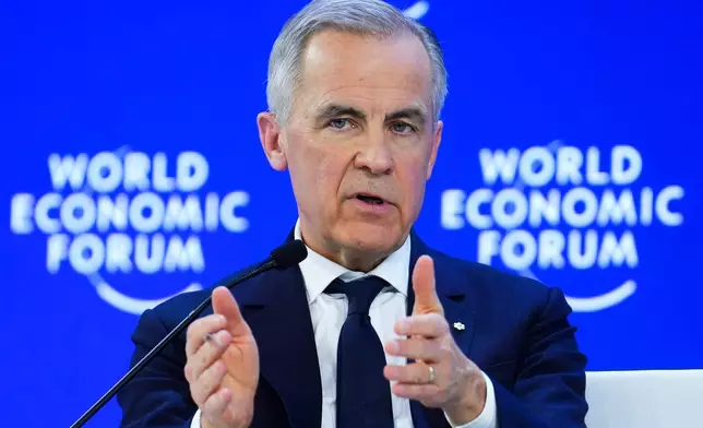 FILE - Canada Prime Minister Mark Carney delivers a speech at the World Economic Forum in Davos, Switzerland on Tuesday, Jan. 20, 2026. (Sean Kilpatrick/The Canadian Press via AP, File)