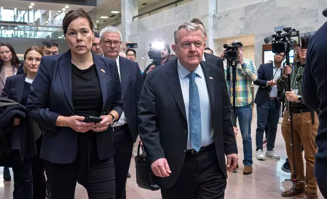 Greenland Foreign Minister Vivian Motzfeldt, left, and Danish Foreign Minister Lars Løkke Rasmussen, arrive on Capitol Hill to meet with members of the Senate Arctic Caucus, in Washington, Wednesday, Jan. 14, 2026. (AP Photo/J. Scott Applewhite)