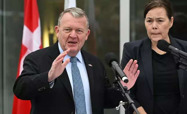 Denmark's Foreign Minister Lars Løkke Rasmussen and Greenland's Foreign Minister Vivian Motzfeldt speak at a news conference at the Embassy of Denmark, Wednesday, Jan. 14, 2026, in Washington. (AP Photo/John McDonnell)