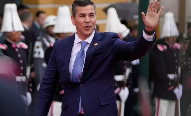 FILE - Paraguay President Santiago Pena arrives for the swearing-in ceremony of President Rodrigo Paz in La Paz, Bolivia, Nov. 8, 2025. (AP Photo/Juan Karita, File)