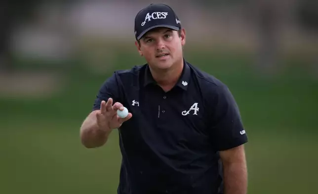 Patrick Reed of the United States reacts after winning the Dubai Desert Classic in United Arab Emirates, Sunday, Jan. 25, 2026. (AP Photo/Altaf Qadri)