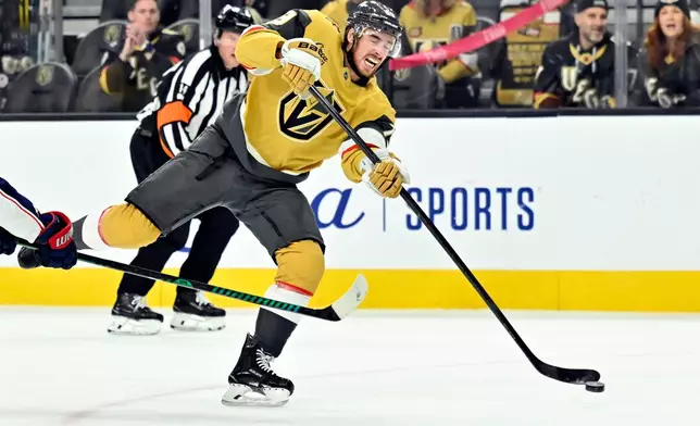 Vegas Golden Knights right wing Reilly Smith shoots against the Columbus Blue Jackets during the second period of an NHL hockey game Thursday, Jan. 8, 2026, in Las Vegas. (AP Photo/David Becker)