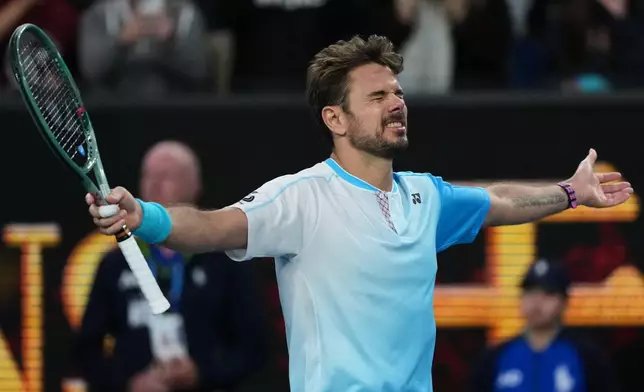Stan Wawrinka of Switzerland celebrates after defeating Arthur Gea of France in their second round match at the Australian Open tennis championship in Melbourne, Australia, Thursday, Jan. 22, 2026. (AP Photo/Asanka Brendon Ratnayake)